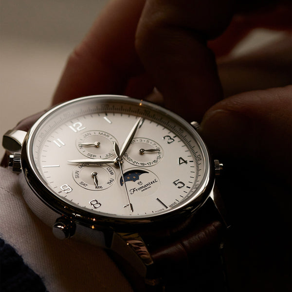 Photo by Fromanteel Watches on January 23, 2023. An image of the Moonphase wrist watch on a male wrist.